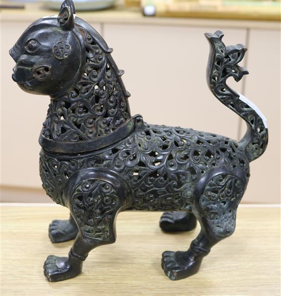 An Islamic bronze tiger incense burner H. 11.5in.